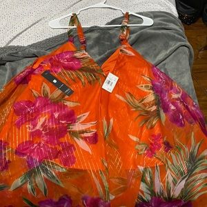 Flowing, sleeveless colorful blouse